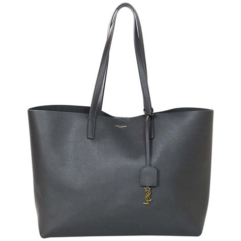 clochette ysl|YSL mini shopping bags.